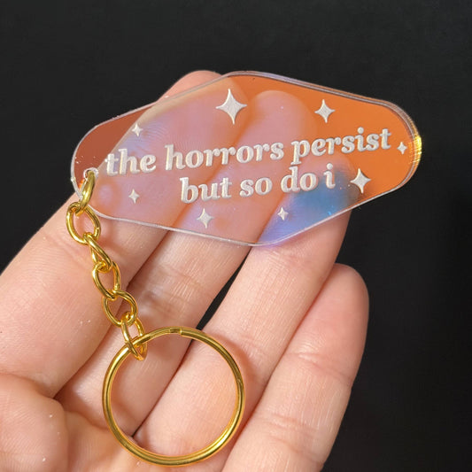 The Horrors Persist But So Do I Motel Iridescent Keychain