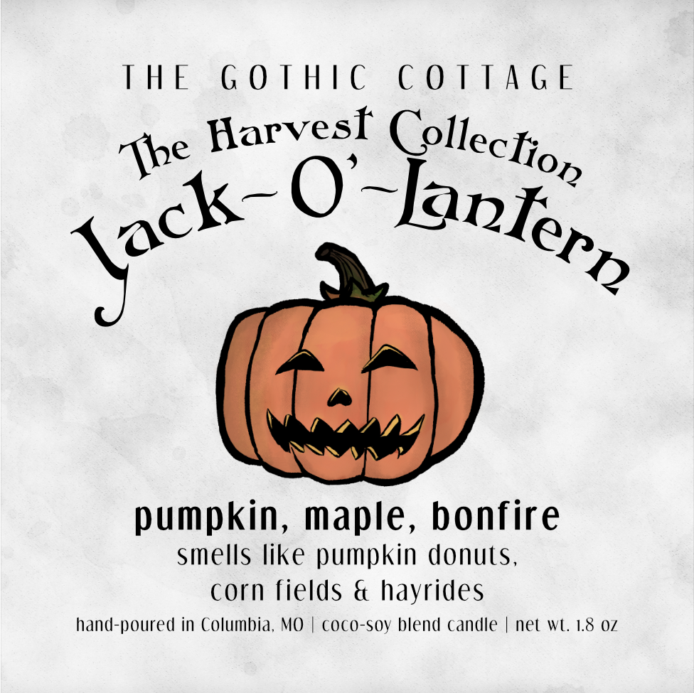 Pumpkin & Bonfire—1.8oz black candle | Jack-O'-Lantern